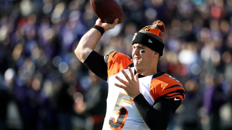 BALTIMORE, MD - NOVEMBER 27: Quarterback AJ McCarron #5 of the Cincinnati Bengals warms up prior to a game against the Baltimore Ravens at M&T Bank Stadium on November 27, 2016 in Baltimore, Maryland. (Photo by Rob Carr/Getty Images)