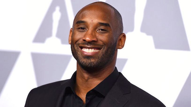 Kobe Bryant arrives at a luncheon for Oscar nominees in The Beverly Hilton on Money February 5, 2018 in Beverly Hills, California.  (Photo by Jordan Strauss/Invision/AP)