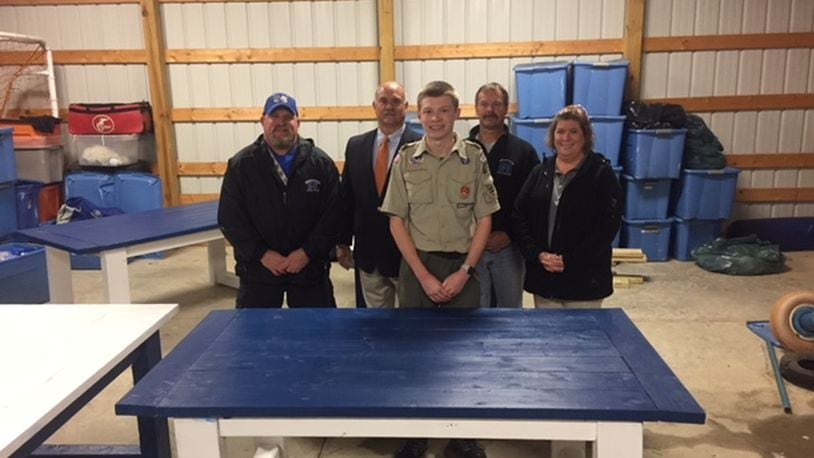 Patrick Parin presents new water tables for his Eagle Scout project at the Miamisburg Middle School football shed next to practice fields. Pictured, from left: Miamisburg Assistant AD Jason Shade; Superintendent Dr. David Vail; Patrick Parin; head football coach Steve Channell; MMS Intervention Specialist Jill Hooper. CONTRIBUTED