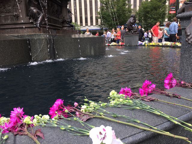 Photos: Locals honor three killed day after Fountain Square shooting