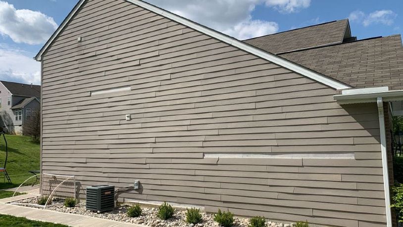 David and Alicia Brown, who live in the 700 block of Nightstar Court, complained to city council after they received notice they violated the city's vinyl ordinance. This is how the siding looked before it was replaced. SUBMITTED PHOTO