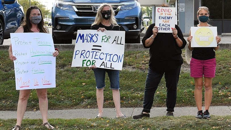 Attempts to remove school board members were not the only demonstrations in the Tipp City school district in 2021. Here, parents voice their opinions about the mask policy at a school board meeting on Tuesday, Sept. 14, 2021. Contributed photo