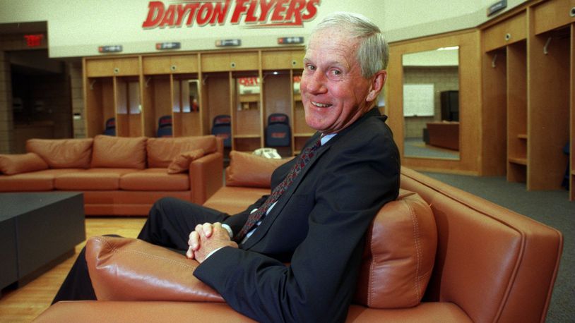 Former Dayton basketball coach Don Donoher relaxes on a leather couch in the new men’s basketball locker room at the Donoher Basketball Center in 1998. Donoher coached the 1966-67 Flyers to a runner-up finish in the NCAA Tournament. FILE PHOTO