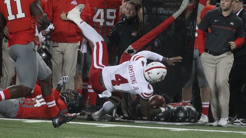 Nebraska quarterback Tommy Armstrong is tackled and hurt on this play. David Jablonski/Staff