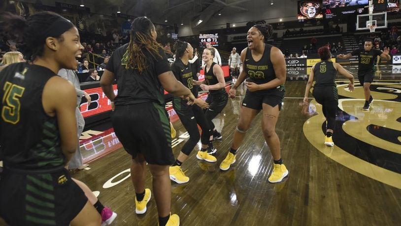 Members of Wright State’s women’s basketball team celebrate their win over Oakland on Saturday that clinched an outright Horizon League title. Jose Juarez/CONTRIBUTED