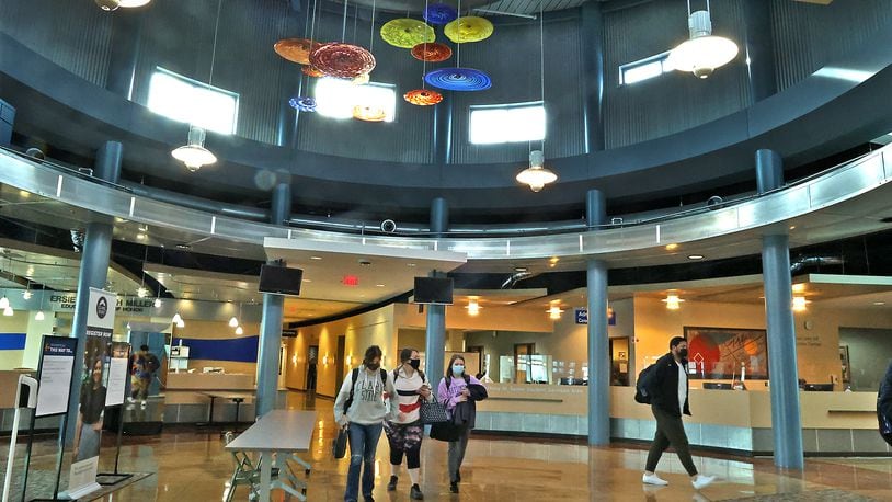 Students walk through the center of the Sara T. Landess Technology and Learning Center at Clark State. BILL LACKEY/STAFF