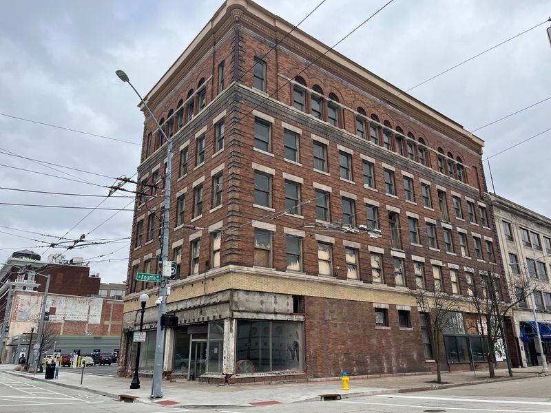 The old Price Stores building is being rehabbed with the help of more than $1 million in state historic preservation tax credits. CORNELIUS FROLIK / STAFF