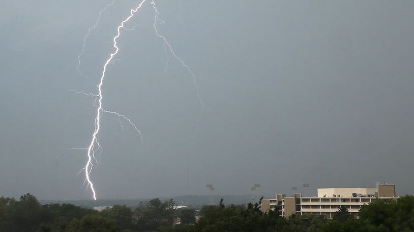2012: Lightning strikes western Montgomery County as seen from S. Main St. on Wednesday, July 18 when thunderstorms moved through the area..  The Dayton Marriot is in the foreground, right.--Staff Photo by Ty Greenlees