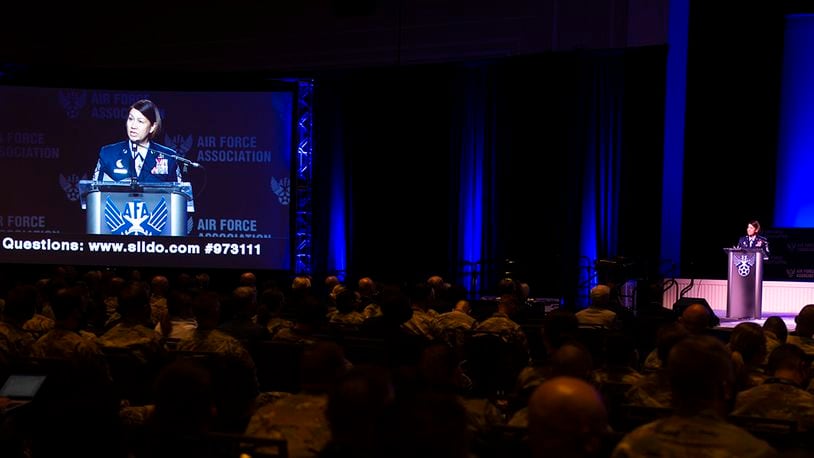 Chief Master Sgt. of the Air Force JoAnne S. Bass delivers remarks and recognizes the 12 Outstanding Airmen of the Year during the 2021 Air Force Association Air, Space and Cyber Conference in National Harbor, Md., Sept. 20. During her opening remarks, Bass reiterated the Air Force’s need to embrace near-peer competition and opened the floor to questions and answers. U.S. AIR FORCE PHOTO/STAFF SGT. ADAM R. SHANKS