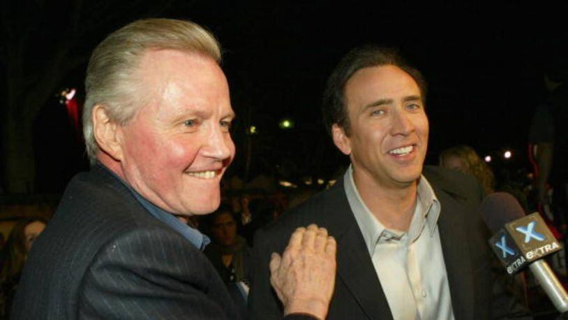 Actors Nicolas Cage, right, and Jon Voight were all smiles after the premiere of "National Treasure" in 2004.