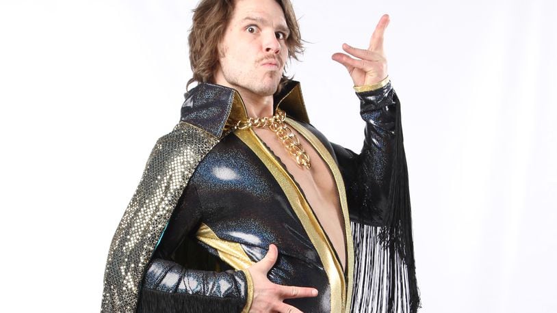 Dalton Castle, real name Brett Giehl, is a highly decorated amateur wrestler, with 10 years experience through college. He went against type for his Dalton Castle persona, a mix of Gorgeous George, Freddie Mercury, David Bowie and Prince. Along with Brett and Brandon Tate, The Boys, the trio are one of the most popular acts in ROH.