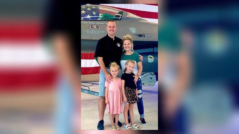 Franklin Mayor Brent Centers poses with his family next to an F-16 assigned to the 180th Fighter Group of the Ohio Air National Guard based in Toledo. Centers, who is a master sergeant in the Air Guard recently received orders to deploy for the sixth time in his 14-year career. Clockwise is Centers, his wife Corrina, daughters Reese and Quinn. CONTRIBUTED