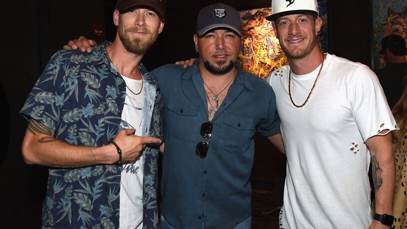 NASHVILLE, TN - AUGUST 02:  Singer/Songwriter Florida Georgia Line's Brian Kelley and Tyler Hubbard with Singer/Songwriter Jason Aldean backstage during Jason Aldean's Triple #1 Party at Wildhorse Saloon on August 2, 2017 in Nashville, Tennessee.  (Photo by Rick Diamond/Getty Images)