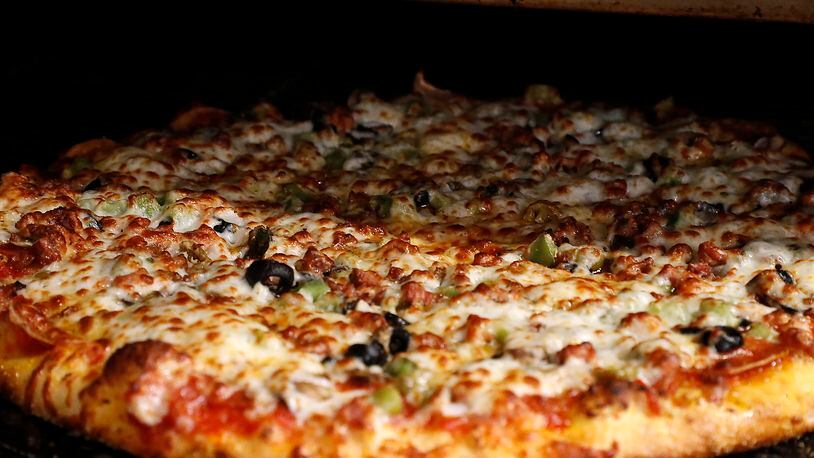 Feb. 9 is National Pizza Day in the U.S. Check out these three spots to pick up a pie for dinner tonight. Bill Lackey/Staff