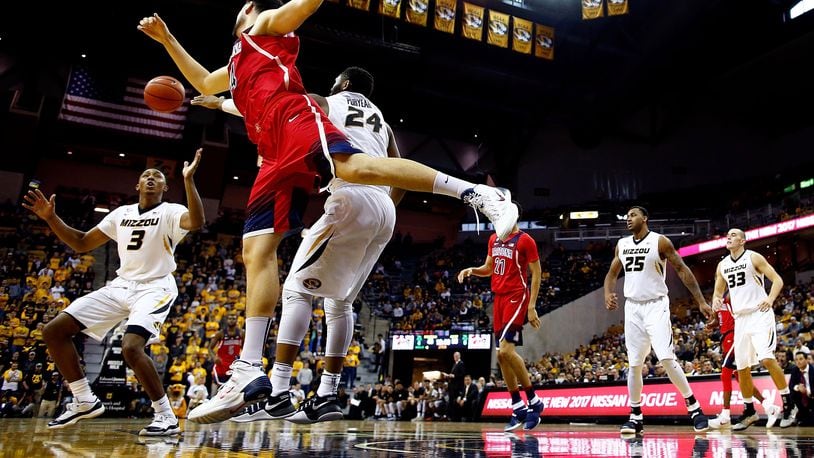 Missouri’s Frankie Hughes, left, competes for a rebound against Arizona at Mizzou Arena on December 10, 2016 in Columbia, Missouri. (Photo by Jamie Squire/Getty Images)