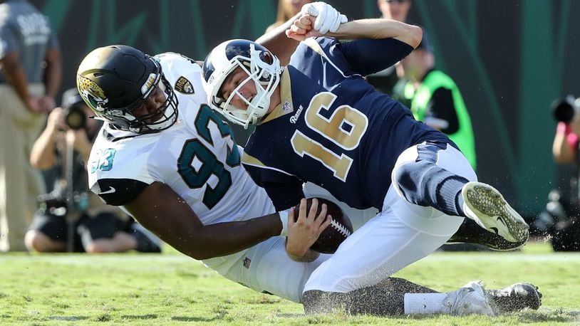 JACKSONVILLE, FL - OCTOBER 15: Calais Campbell #93 of the Jacksonville Jaguars sacks Jared Goff #16 of the Los Angeles Rams in the first half of their game against the Jacksonville Jaguars at EverBank Field on October 15, 2017 in Jacksonville, Florida. (Photo by Sam Greenwood/Getty Images)