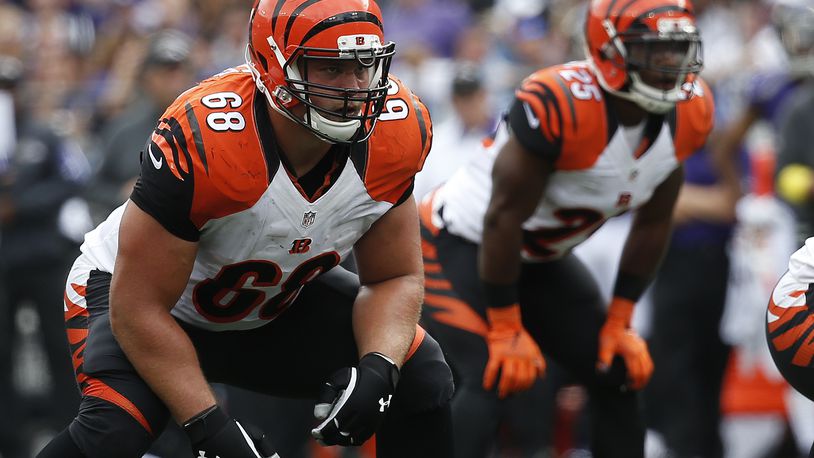 BALTIMORE, MD - SEPTEMBER 27: Guard Kevin Zeitler #68 of the Cincinnati Bengals and running back Giovani Bernard #25 of the Cincinnati Bengals stand at the line of scrimmage in the second quarter of a game against the Baltimore Ravens at M&T Bank Stadium on September 27, 2015 in Baltimore, Maryland. (Photo by Rob Carr/Getty Images)