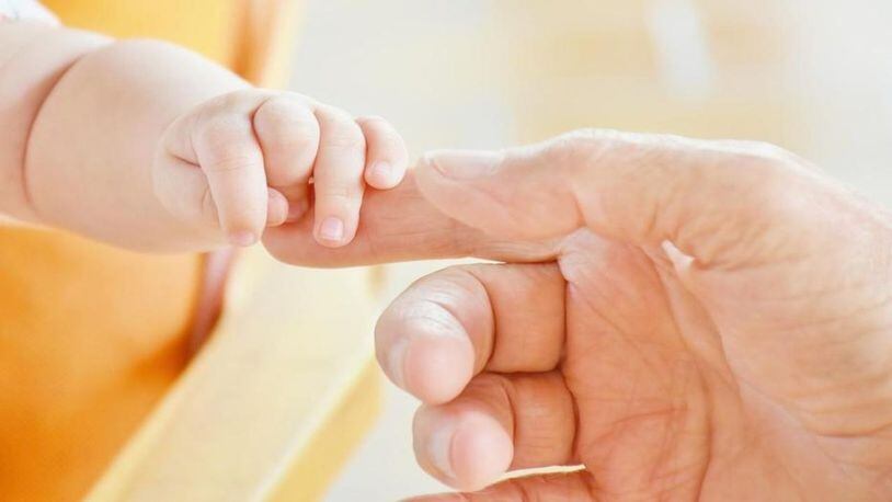 Stock photo of an infant's hand.
