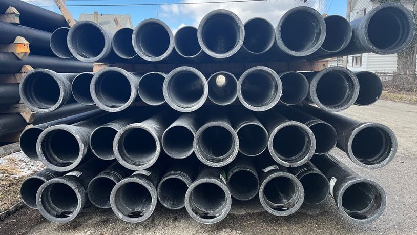 Water pipes stacked up in East Dayton. CORNELIUS FROLIK / STAFF FILE