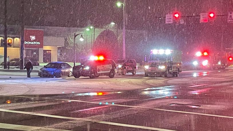 The driver of a red car walked away, headed east down Stroop Road Sunday night, Jan. 16, 2022, after a two-car injury crash at the intersection of Stroop Road and Far Hills Avenue in Kettering. JEN BALDUF / STAFF