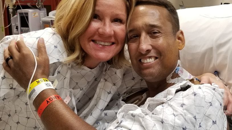 Ross Twp. Police Chief Darryl Haussler and his kidney donor Maria Wessel after the kidney transplant surgery on Monday at the University of Cincinnati Medical Center.