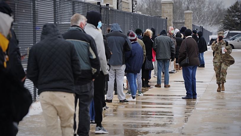 People wait in line at the Montgomery County Fairgrounds for free coronavirus testing on Tuesday, Dec. 1, 2020. STAFF/MARSHALL GORBY