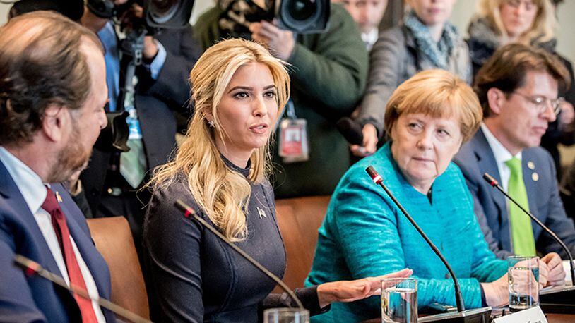 Ivanka Trump, left, speaks next to German chancellor Angela Merkel during a meeting with industry representatives on March 17, 2017 in Washington, D.C.