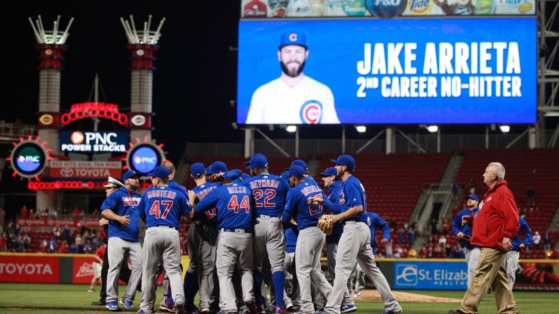 The Cubs celebrate Jake Arrieta’s no-hitter against the Reds on Thursday, April 21, 2016, at Great American Ball Park in Cincinnati. David Jablonski/Staff