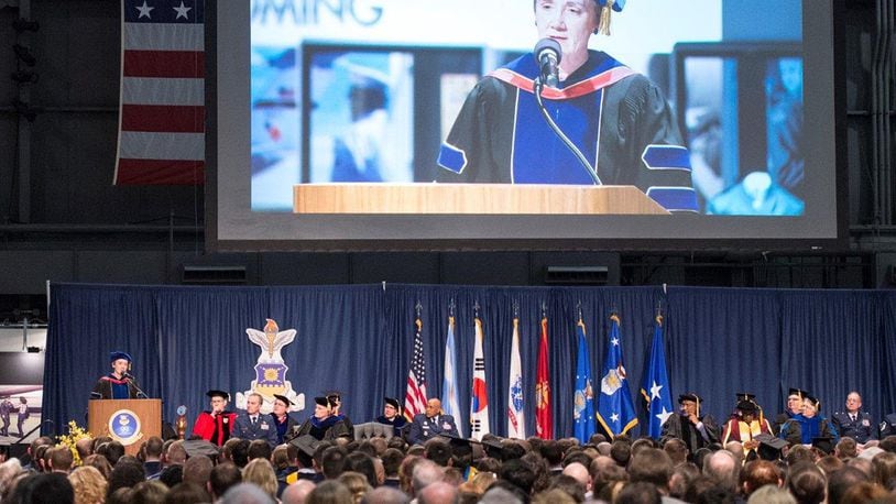 Secretary of the Air Force Heather Wilson gives remarks during the 2018 Air Force Institute of Technology commencement ceremony inside the National Museum of the United States Air Force March 22. AFIT is focused on providing exceptional defense-focused research-based graduate education. (U.S. Air Force photos/Wesley Farnsworth)