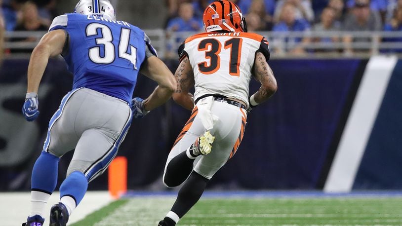 DETROIT, MI - AUGUST 18: Derron Smith #31 of the Cincinnati Bengals makes the pickoff of the pass from Dan Orlovsky (not in photo) and runs for a second quarter touchdown during the preseason game against the Detroit Lions at Ford Field on August 18, 2016 in Detroit, Michigan. (Photo by Leon Halip/Getty Images)