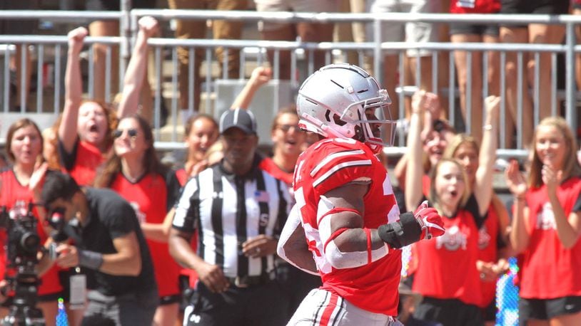 Ohio State’s Mike Weber runs for a touchdown against Oregon State on Saturday, Sept. 1, 2018, at Ohio Stadium in Columbus. David Jablonski/Staff