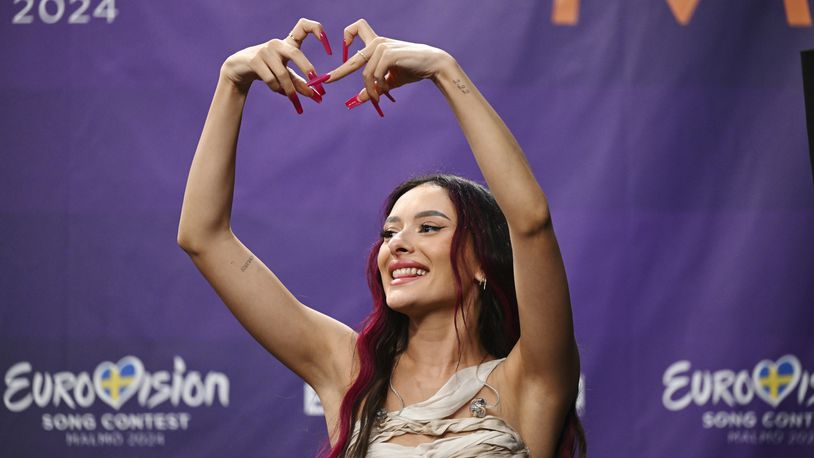 Eden Golan representing Israel gestures during a press meeting with the entries that advanced to the final after the second semi-final of the 68th edition of the Eurovision Song Contest at the Malmö Arena, in Malmö, Sweden, Thursday, May 9, 2024. (Jessica Gow/TT News Agency via AP)