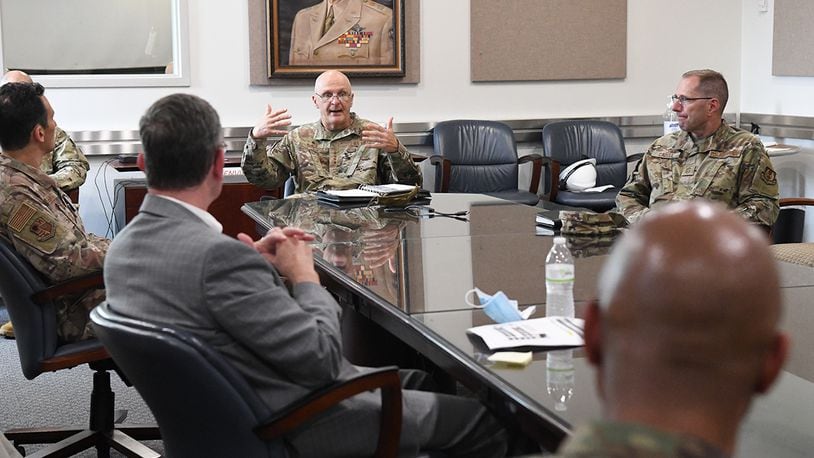 Gen. Arnold W. Bunch Jr. (center), commander, Air Force Materiel Command, initiates a discussion about diversity and inclusion with Arnold Engineering Development Complex senior leadership July 8 at Arnold Air Force Base, Tenn., headquarters of AEDC. Also pictured, Chief Master Sgt. Stanley Cadell (right), command chief, AFMC. Bunch and Cadell also held a diversity and inclusion discussion session with members of AEDC, including uniformed Airmen, Department of Defense civilians and contractors. (U.S. Air Force photo/Jill Pickett)