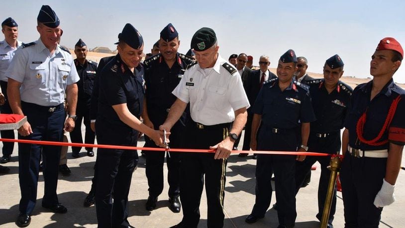 A ribbon-cutting ceremony at Cairo West Air Base, marking the completion of a $184 million construction project and delivery of 20 F-16s. U.S. Air Force Brig. Gen Brian Bruckbauer (left), director of the Air Force Security Assistance and Cooperation Directorate, and U.S. Army Maj. Gen. Ralph Groover III (middle right) the Senior Defense Official, United States Embassy, Cairo Egypt, attended the event.