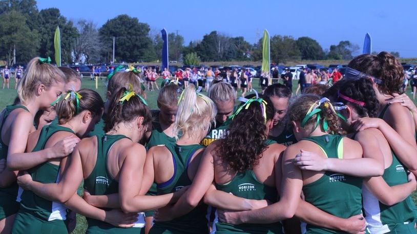 Wright State’s women’s cross country team huddles before the Friendship Invitational earlier this season. Photo courtesy of Wright State