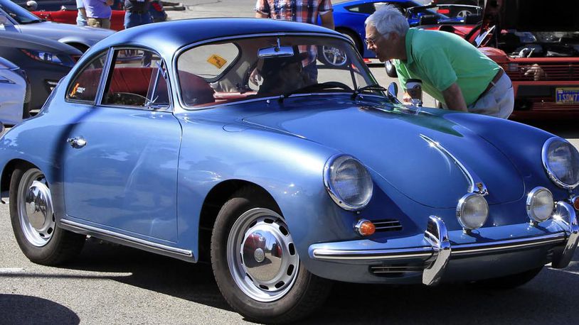 Bill Myers pulls out in his Porsche 356 at Cars & Coffee. © 2014 Photograph by Skip Peterson