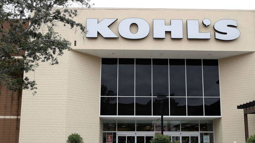 A 39-year-old woman, believed to be shoplifting, was hit by a car after she ran out of a Kohl's department store Saturday night, police said.