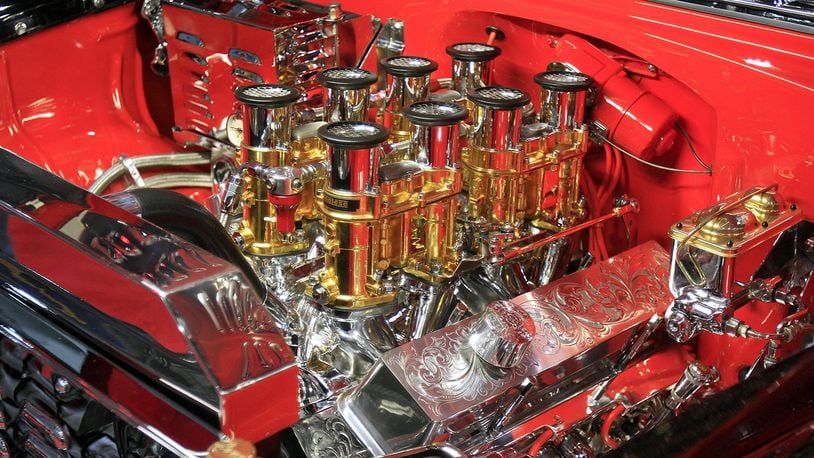 Engines get serious chrome and gold treatment, and nearly everything under the hood is polished on cars at the Cavalcade of Customs in Cincinnati. Photograph by Skip Peterson