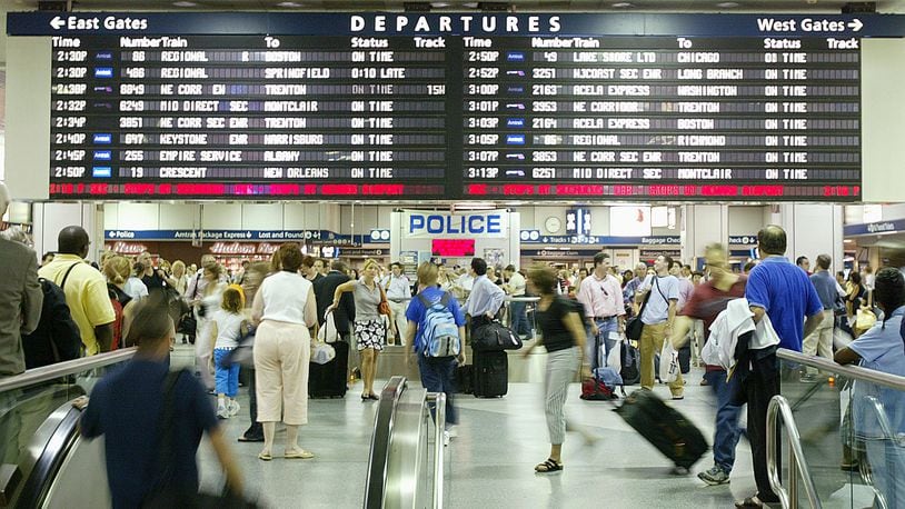 NEW YORK - JULY 2: Commuters and travelers wait for their trains in Penn Station July 2, 2004 in New York City. AAA estimates that 39.4 millions Americans will travel 50 miles or more from home this July 4 holiday weekend. (Photo by Mario Tama/Getty Images)