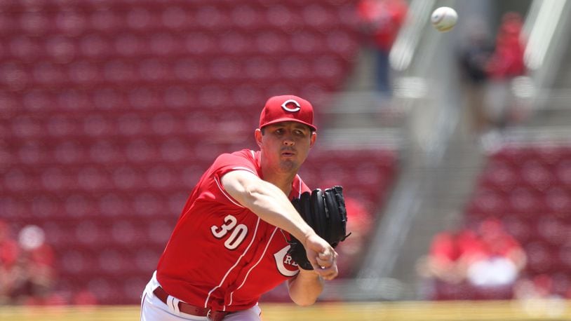 Reds starter Tyler Mahle pitches against the Rockies on Thursday, June 7, 2018, at Great American Ball Park in Cincinnati.
