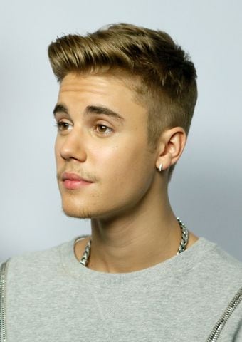 Effort aside to look manlier, Justin Bieber doesn't quite have the rugged manly looks to match.