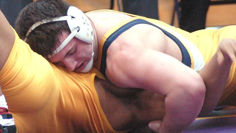 Springfield’s Joe Cochran works for the fall during his 195-pound title match at the GWOC tournament last year at Butler High School. Cochran claimed his second title with a fall in 5:33. JOHN CUMMINGS / CONTRIBUTED