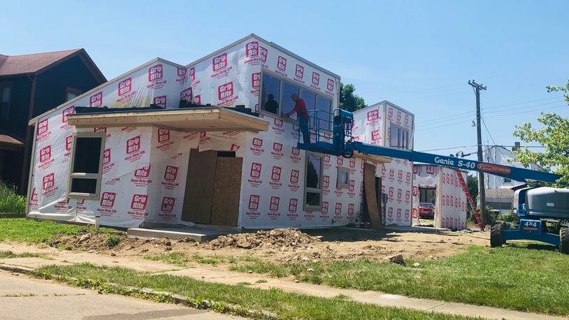 New single-family homes are being built on the western end of South Park by the owners of Coco’s Bistro. CORNELIUS FROLIK / STAFF