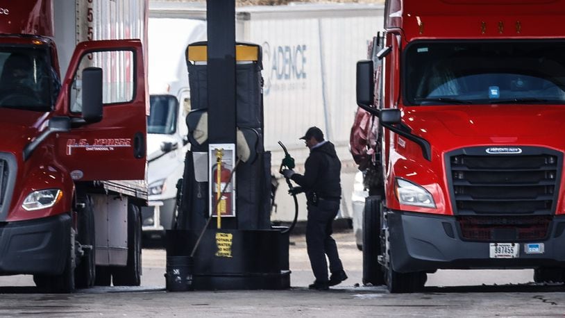 A trucker fills up his rig at Love's Travel stop at Edwin C. Moses and Interstate 75 in Dayton. Diesel fuel prices have been rising because of supple chain issues. JIM NOELKER/STAFF