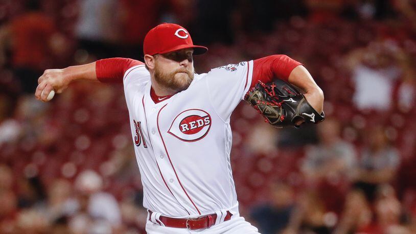 Cincinnati Reds relief pitcher Drew Storen throws in the ninth inning against the Baltimore Orioles, Tuesday, April 18, 2017, in Cincinnati. The Reds won 9-3. (AP Photo/John Minchillo)