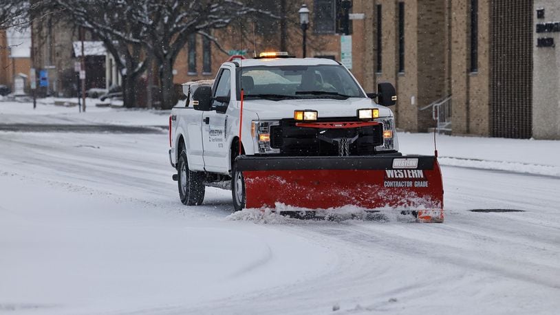 City crews work to clear snow on the streets of Middletown, Jan. 17, 2022. NICK GRAHAM/STAFF