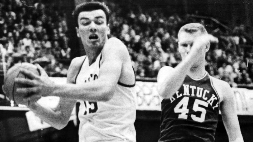 Hank Finkel (left) of the University of Dayton faces Kentucky in a 1966 NCAA tournament regional semifinal in Iowa City, Iowa. DAYTON DAILY NEWS FILE PHOTO