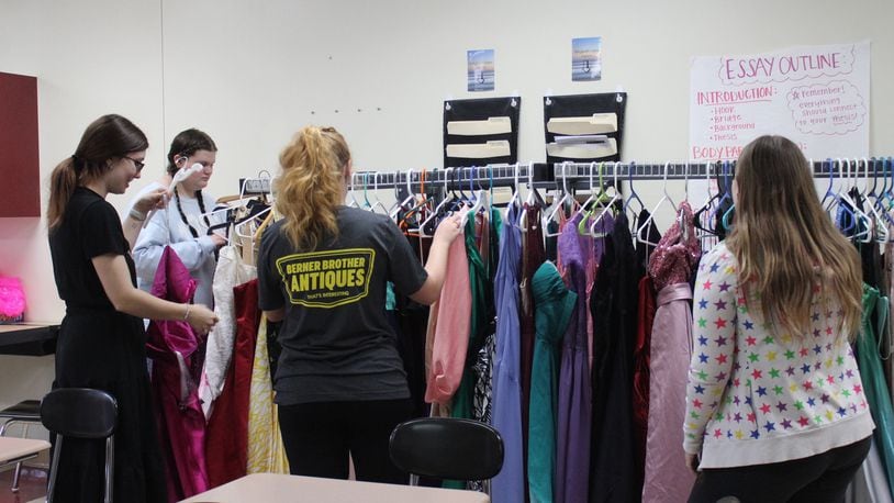 Tecumseh High School English teacher Mackenzie Krapfel spent the last month collecting dresses for girls that needed them for prom. Contributed