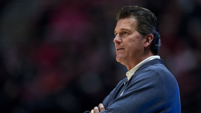 Nevada head coach Steve Alford looks on during the first half of an NCAA college basketball game against San Diego State, Tuesday, Jan. 10, 2023, in San Diego. (AP Photo/Gregory Bull)