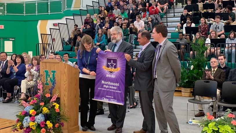 Northmont High School was named a Purple Star School by the Ohio Department of Education on Friday. Left to right: Sheree Coffman, military liason; Paolo DeMaria, ODE Superintendent of Public Instruction; Tony Thomas, Northmont City Schools Superintendent; Jason Inkrott, Principal of Northmont High School. EMILY KRONENBERGER/STAFF PHOTO